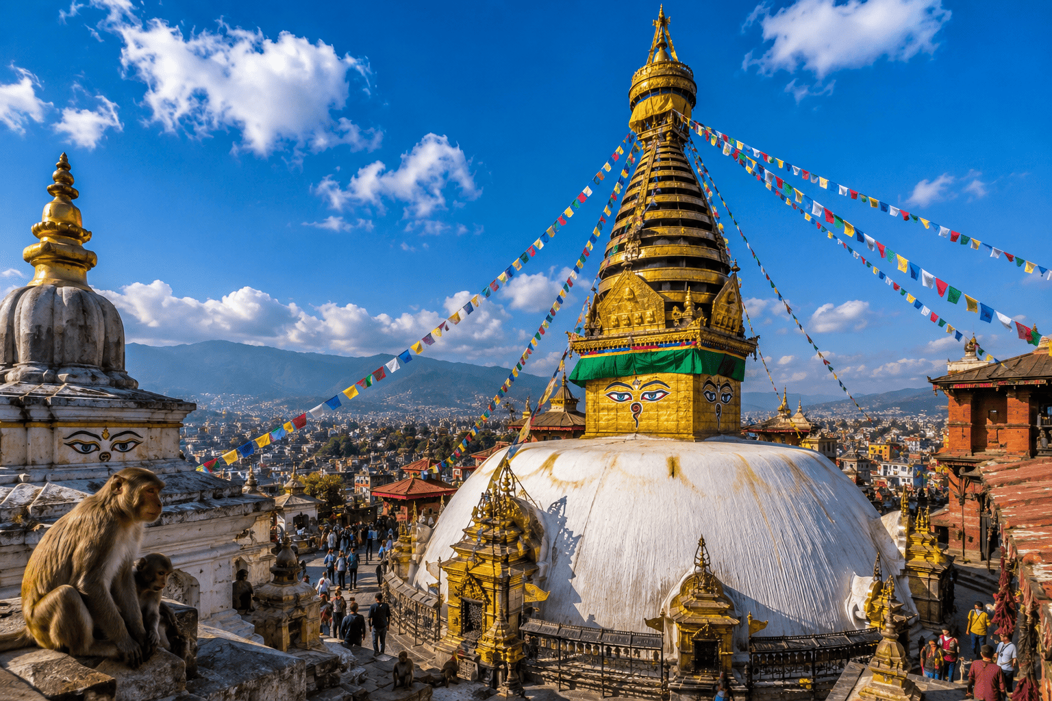 Golden stupa of Swayambhunath with prayer flags overlooking Kathmandu valley